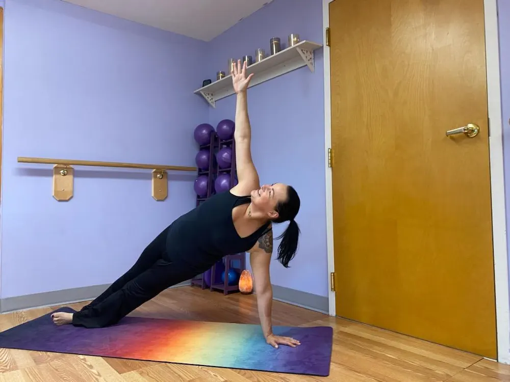 Side plank on a rainbow mat